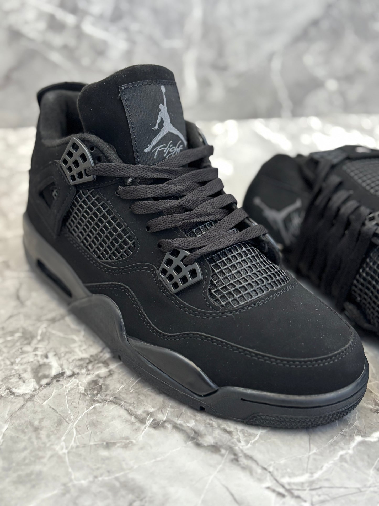 Air Jordan 4 Retro "Black Cat"