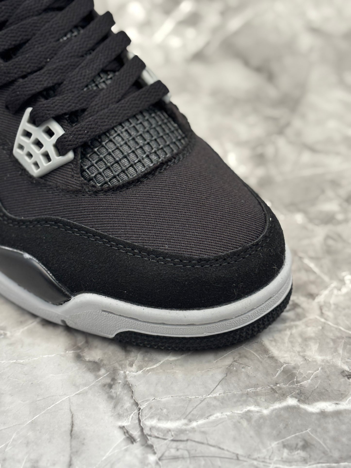 Air Jordan 4 Retro "Black Canvas"