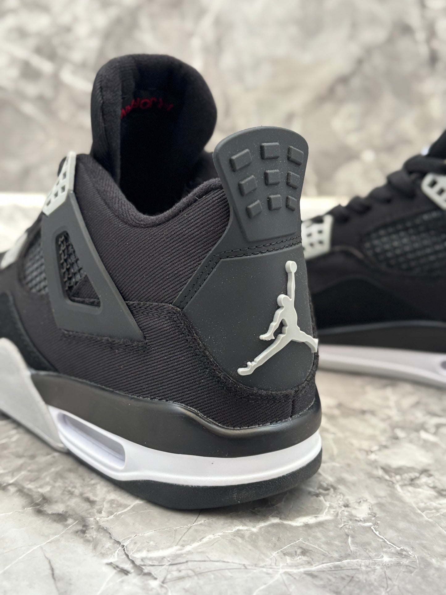 Air Jordan 4 Retro "Black Canvas"