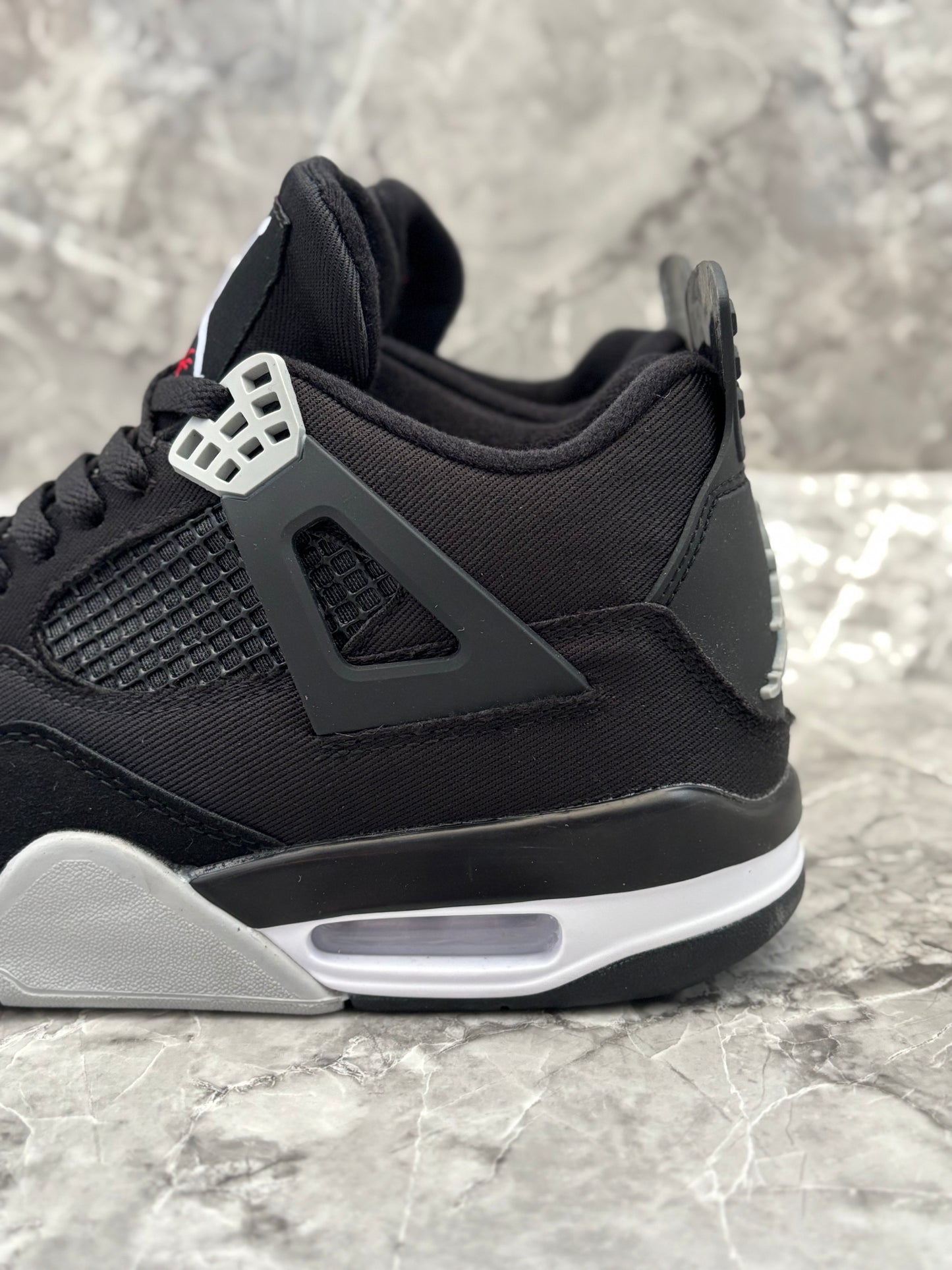 Air Jordan 4 Retro "Black Canvas"
