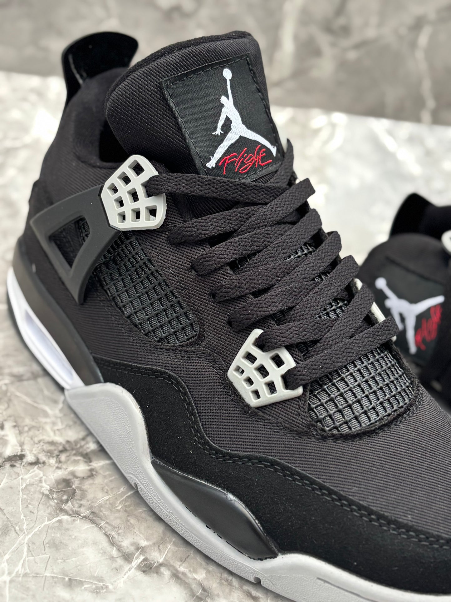Air Jordan 4 Retro "Black Canvas"
