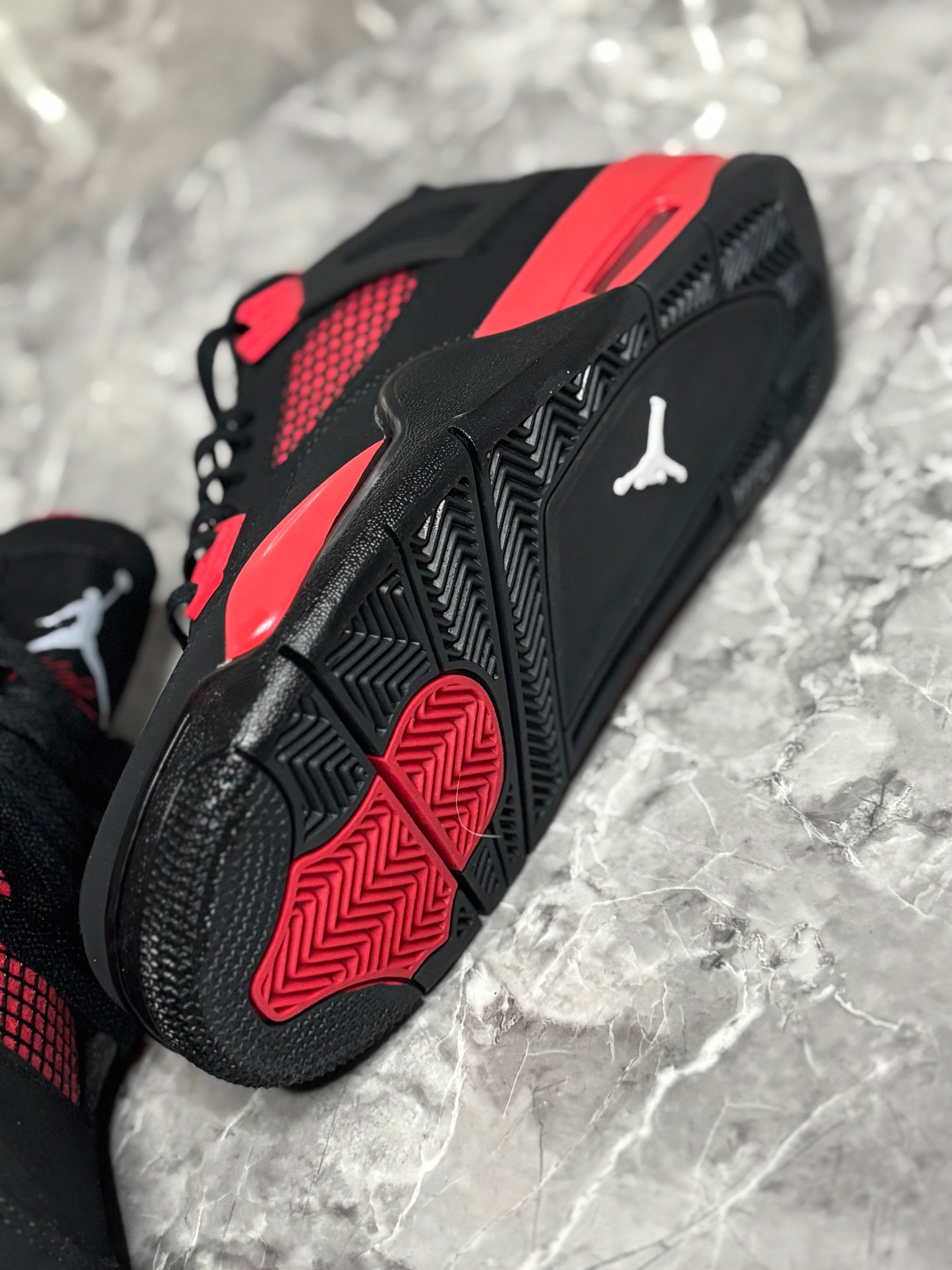 Air Jordan 4 Retro "Red Thunder"